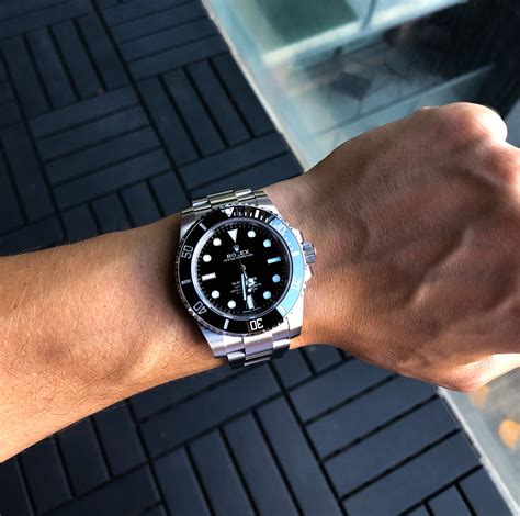 rolex submariner ceramic wrist shot|rolex 114060 vs 124060.